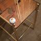 Brass and porcelain bedside table