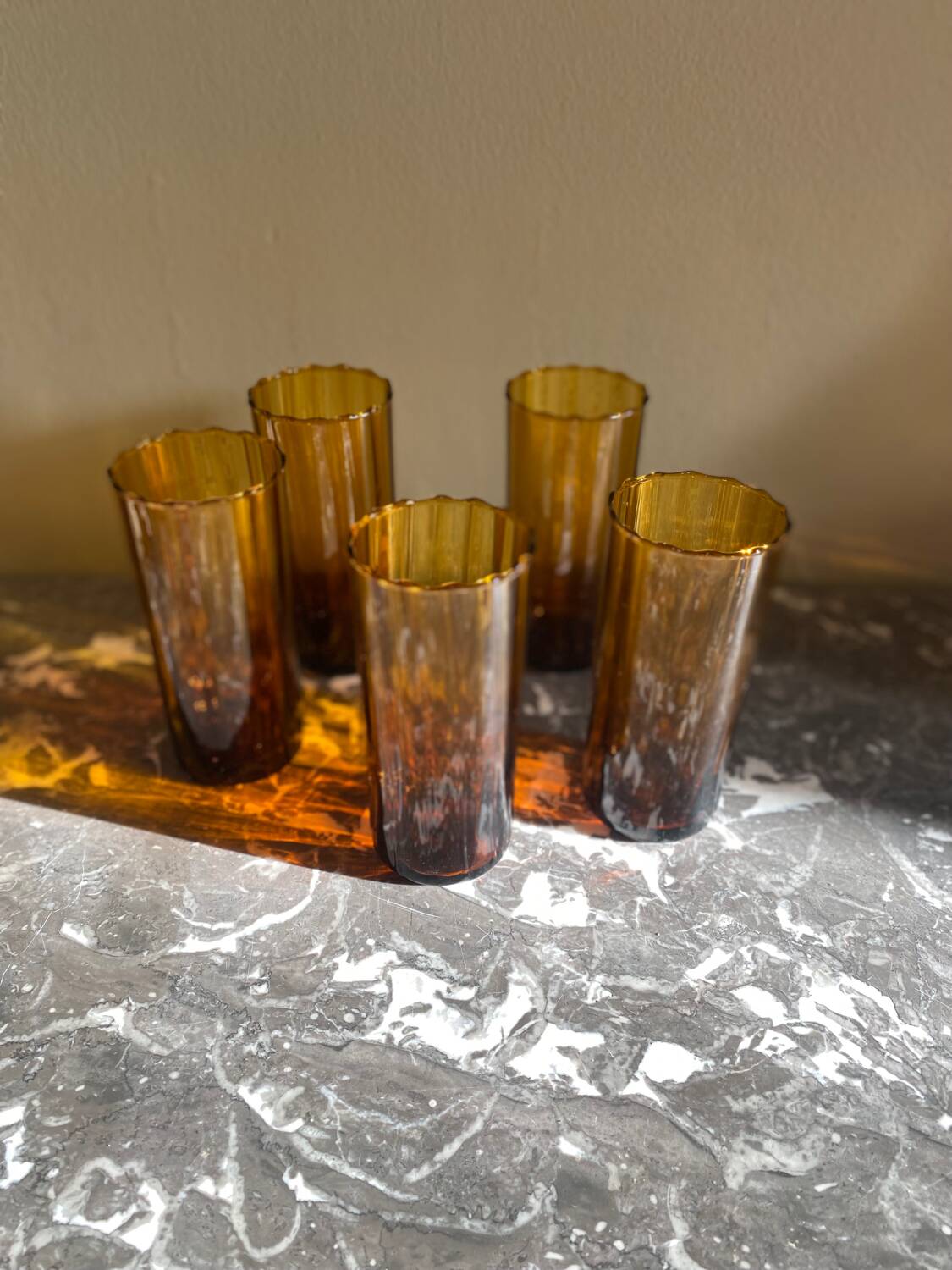 5 amber glasses
