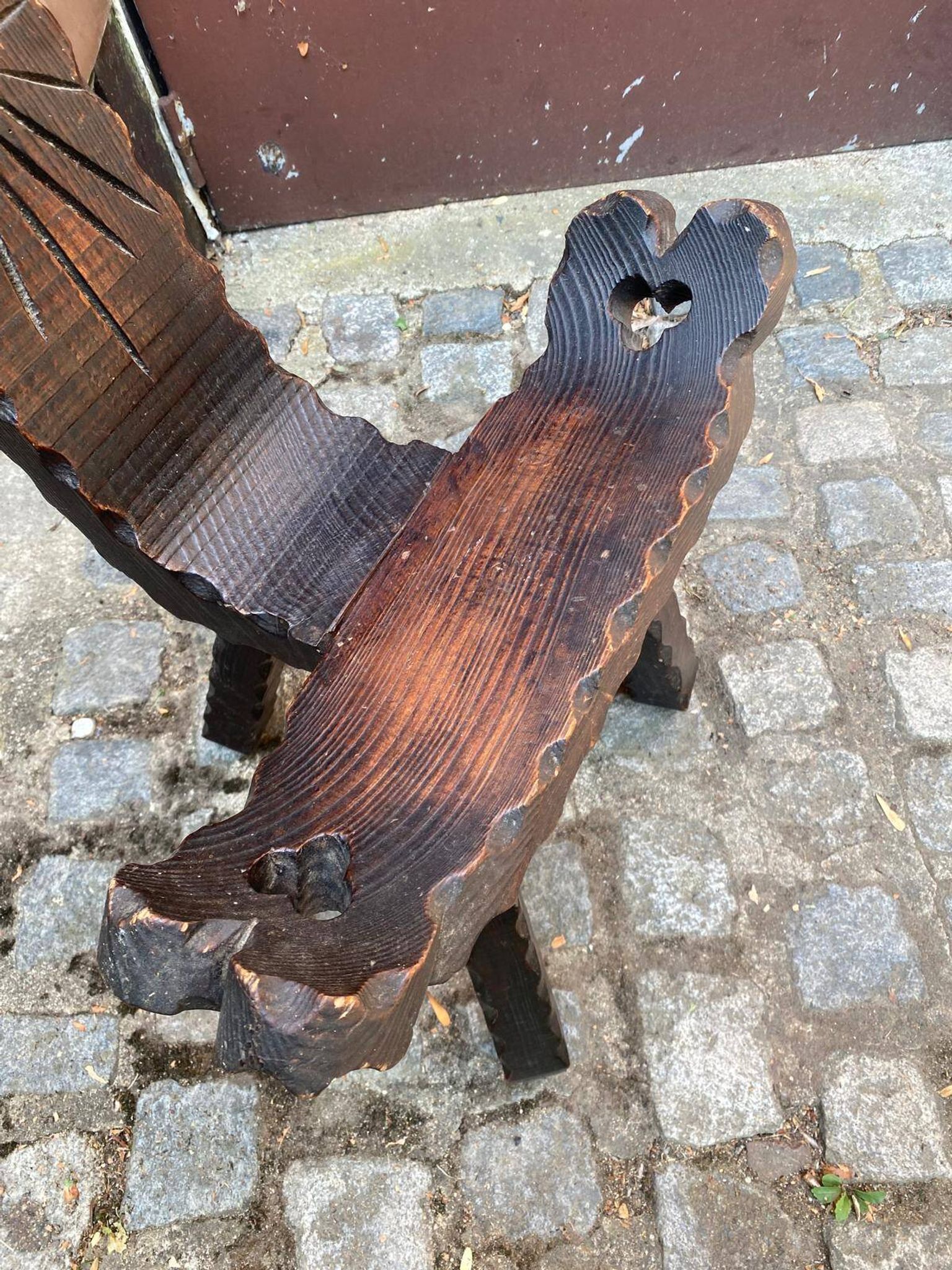 Vintage brutalist tripod chair in carved wood with wooden screw assembly XI.