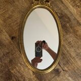 Oval gold knot mirror