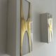 Pair of Loewy wall lights for Hilton, brass and Perspex, France 1965