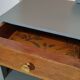 Art deco style bedside table - asymmetrical mustache foot