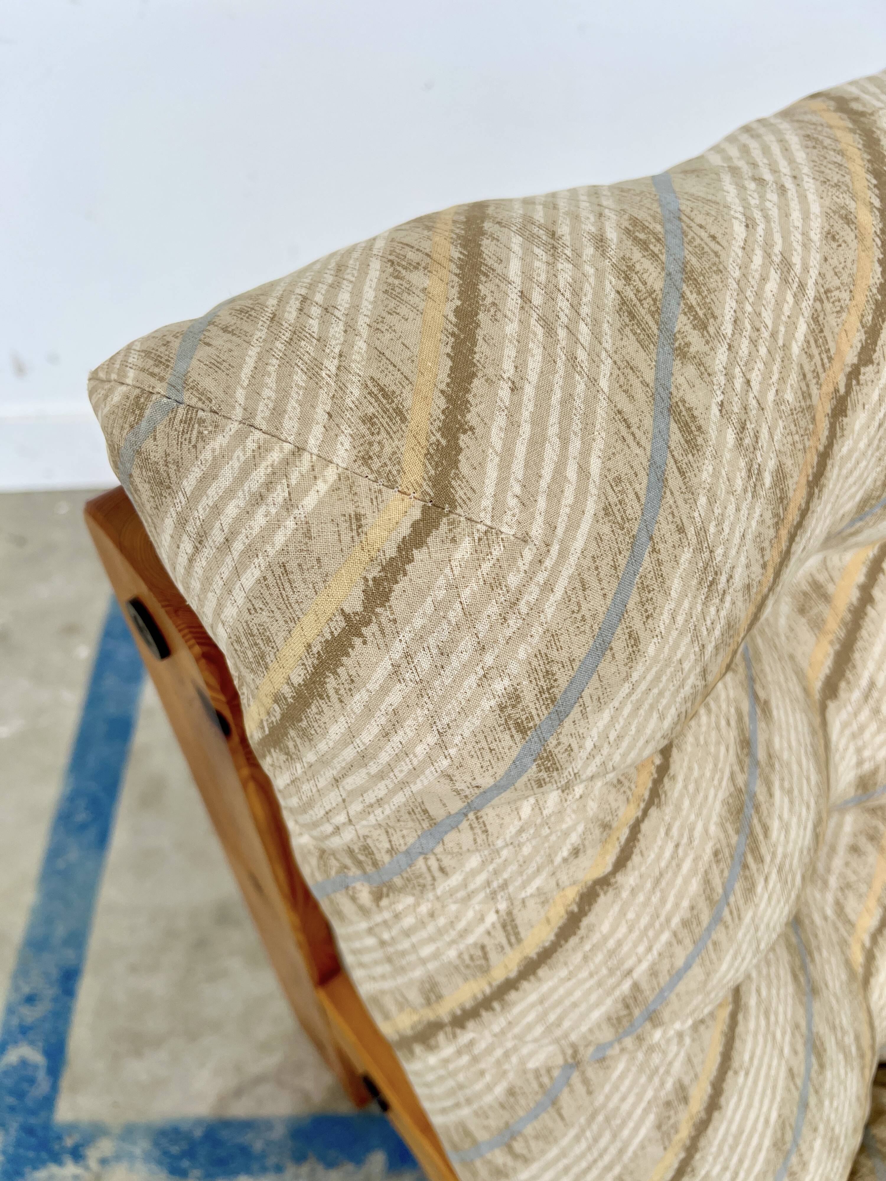 80s armchair with striped fabric and pine structure