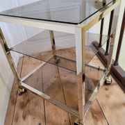 Gold metal and smoked glass serving trolley