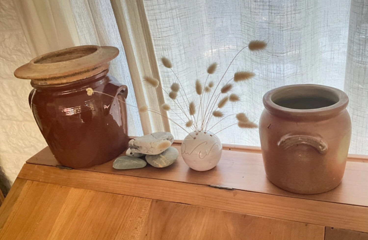 Ancient ceramic salt cellar and its lid.