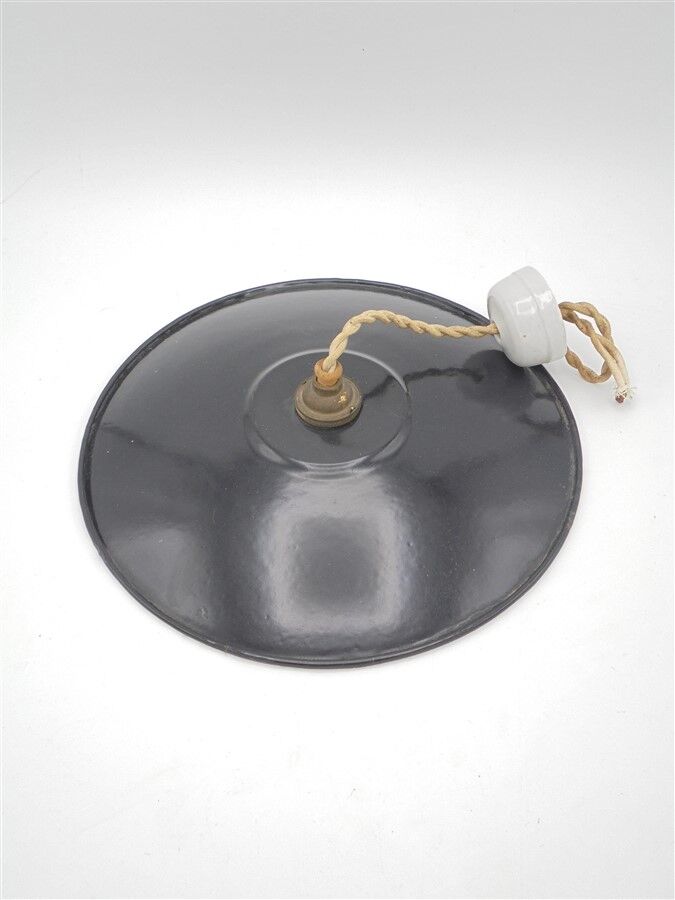 Hanging in black enamelled plate