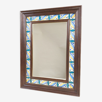 Mirror with wooden frame and painted ceramic tiles