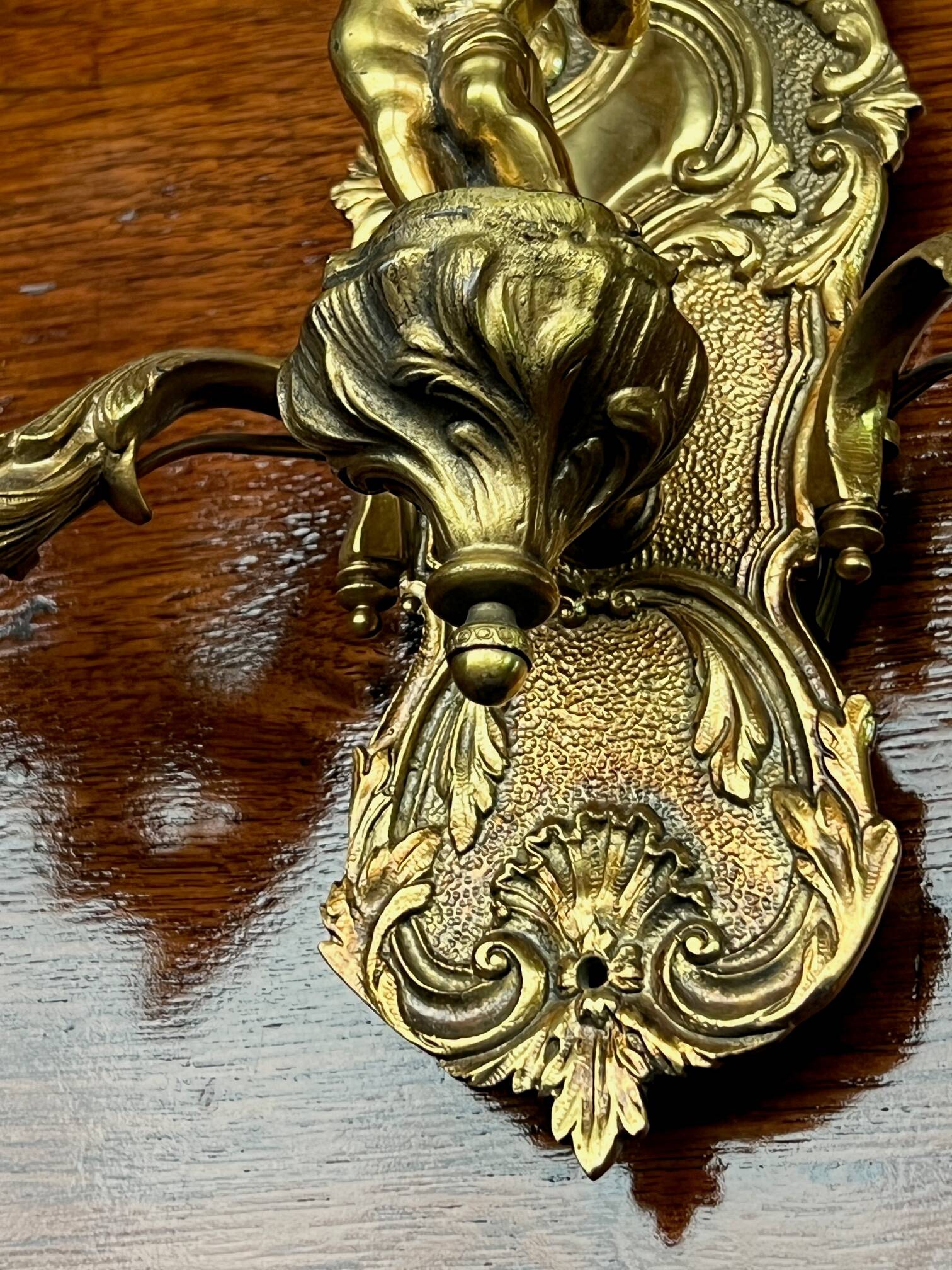 Pair of Louis XV style wall lights. Solid gilded bronze.