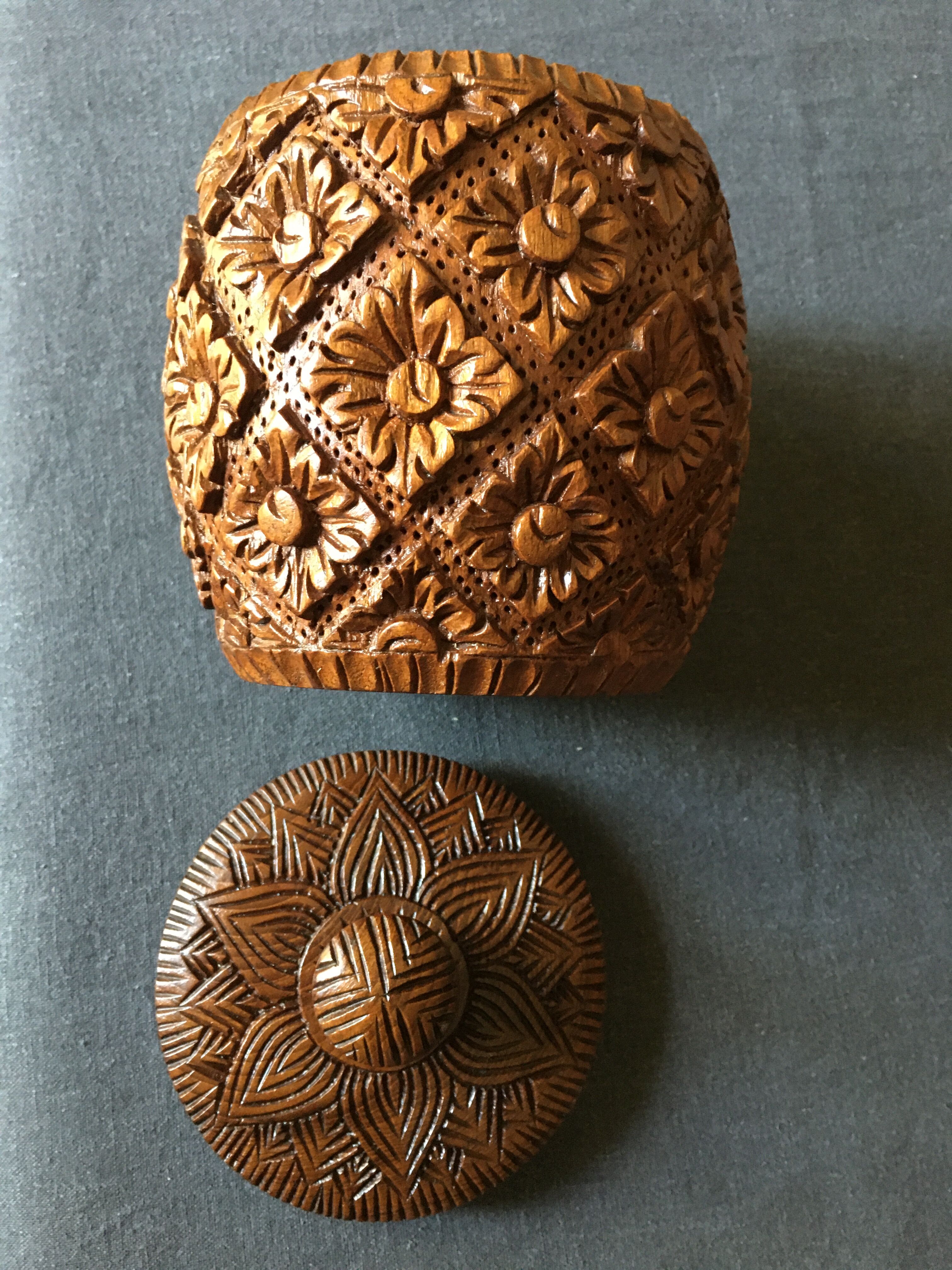 8 coasters and carved wooden box