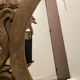 Carved mirror with integrated shelf