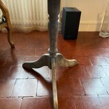 Patinated wooden pedestal table