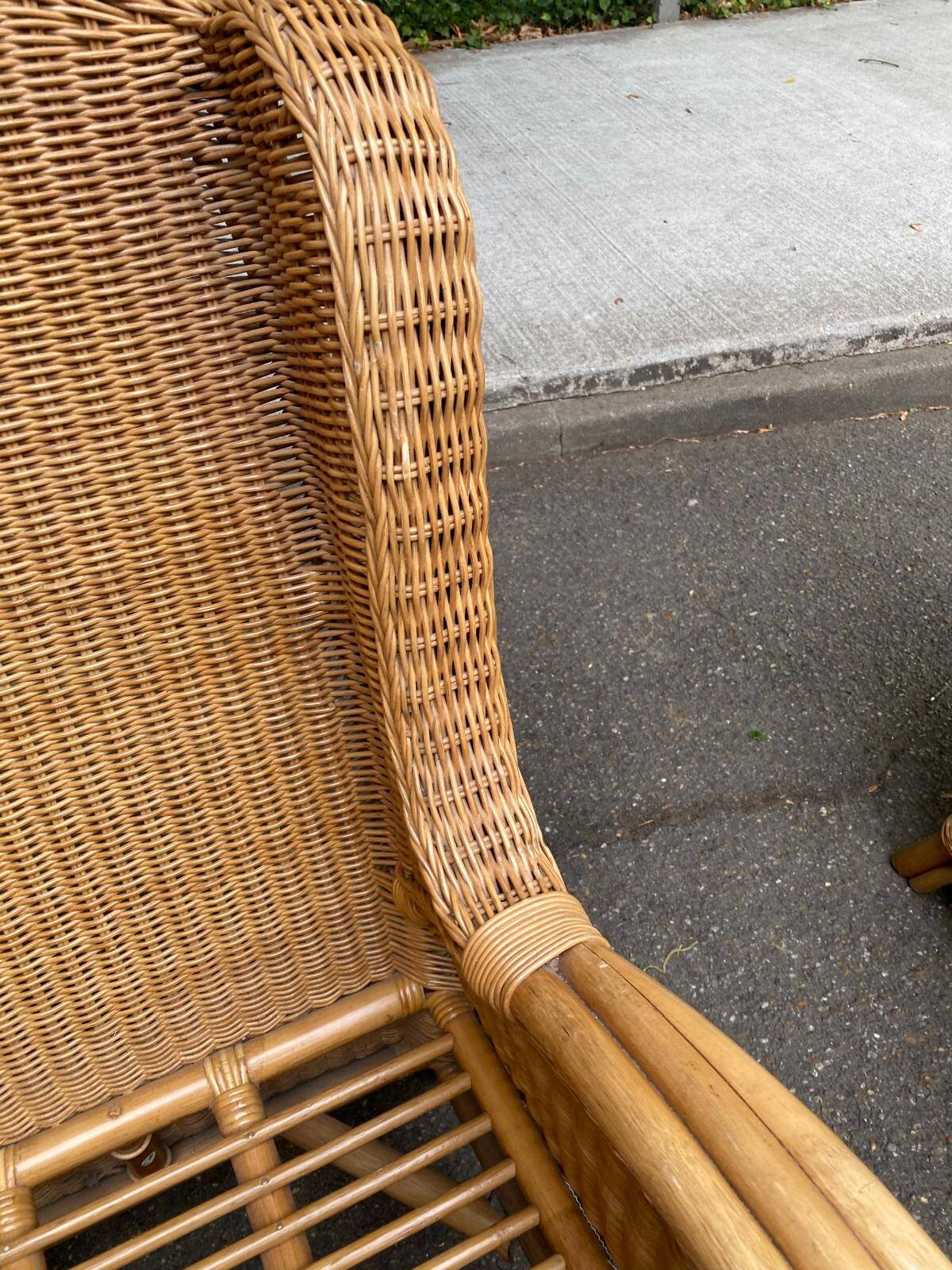 2 rattan and woven wicker armchairs in vintage 70s style