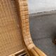 2 rattan and woven wicker armchairs in vintage 70s style