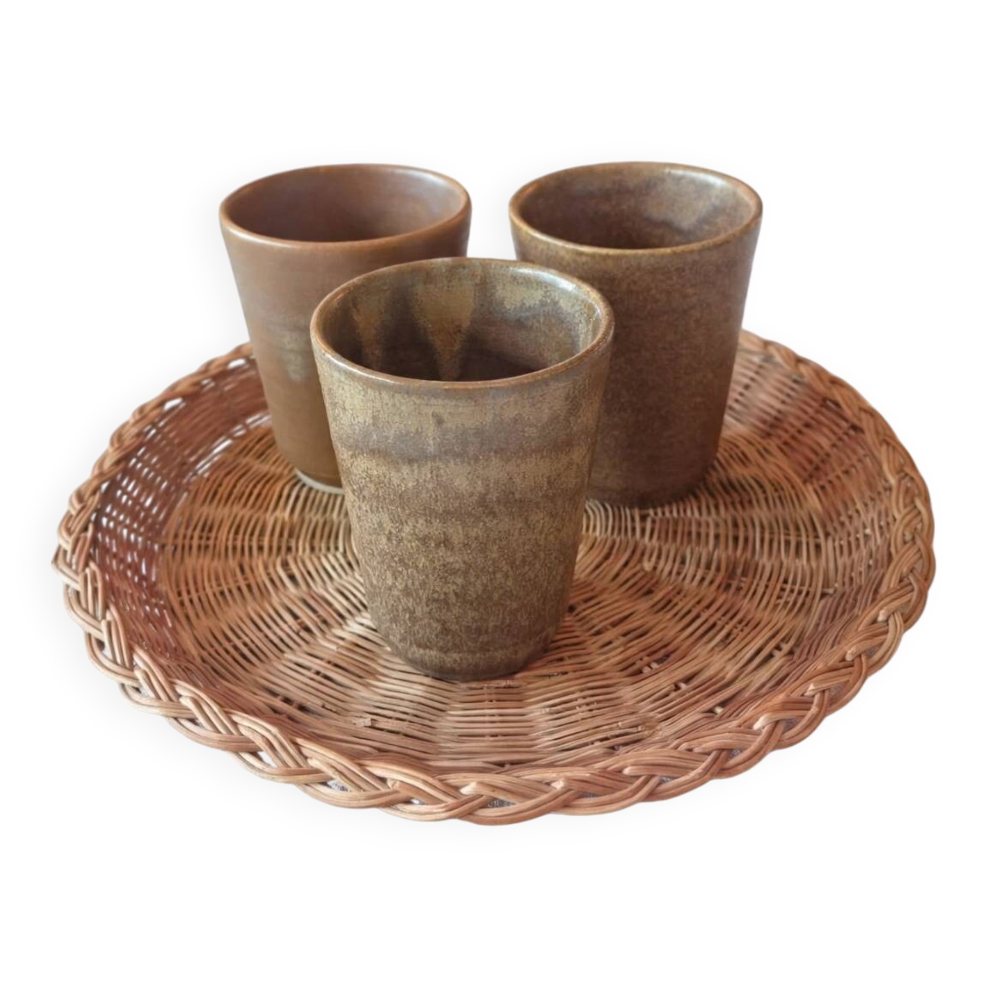3 vintage 70s glazed stoneware cups and the wicker tray.