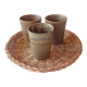 3 vintage 70s glazed stoneware cups and the wicker tray.
