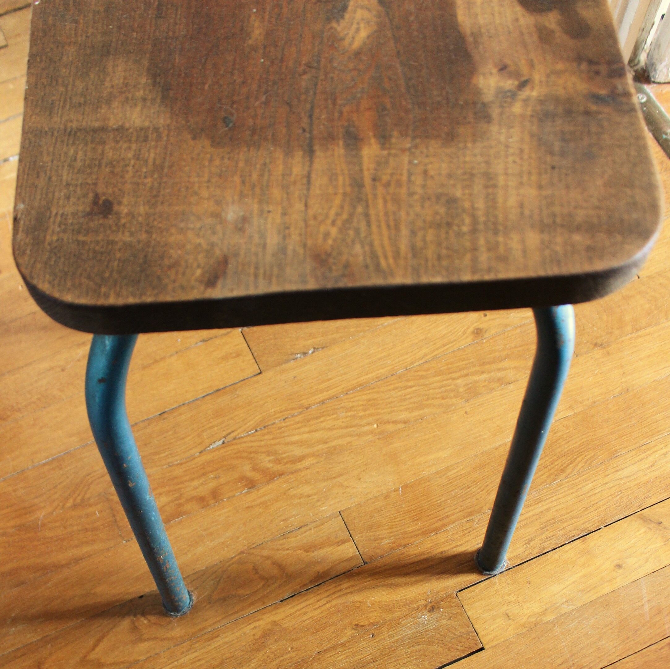 Industrial stool sitting wood feet metal blue metal feet