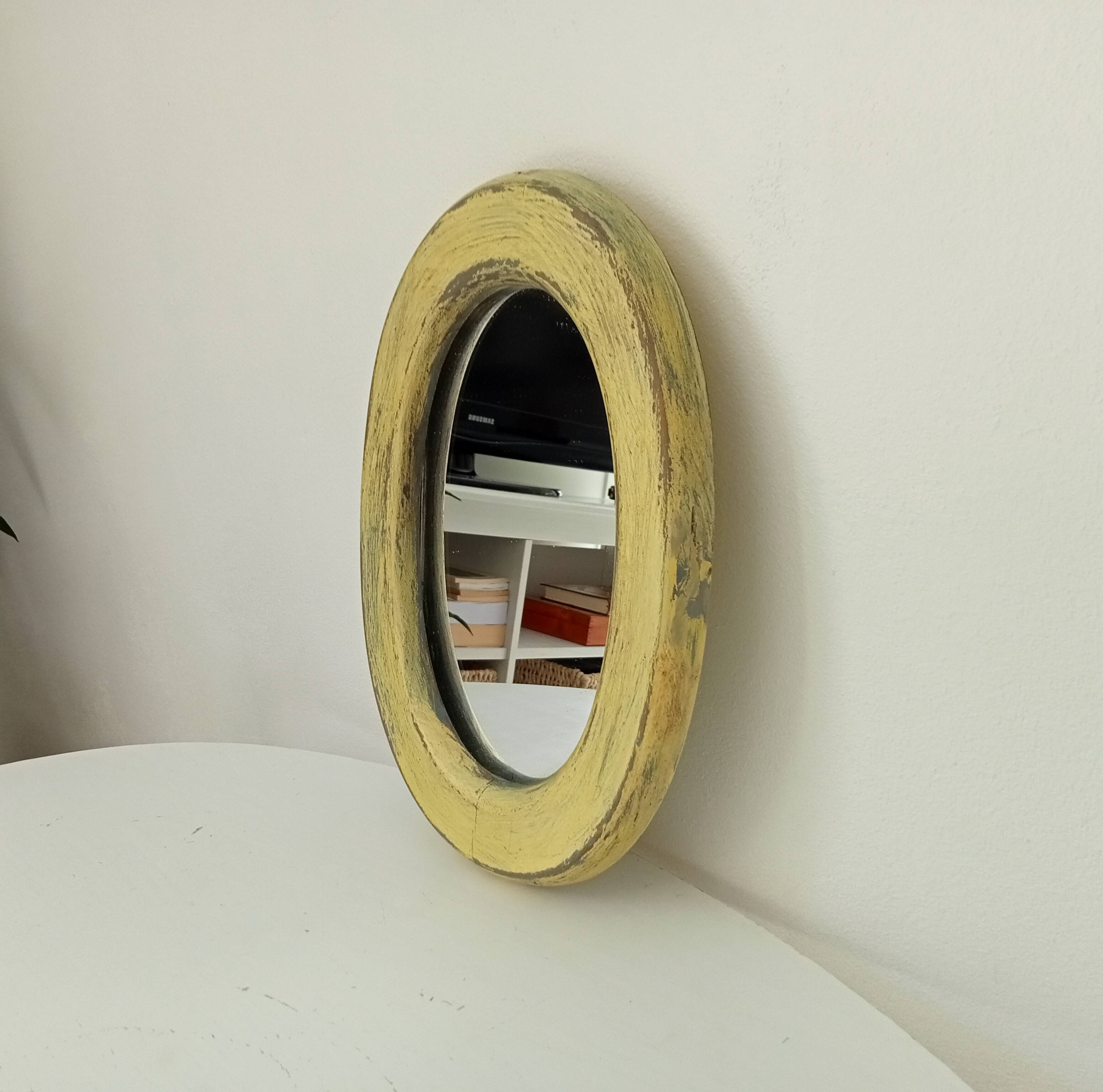 Small antique oval mirror