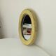 Small antique oval mirror