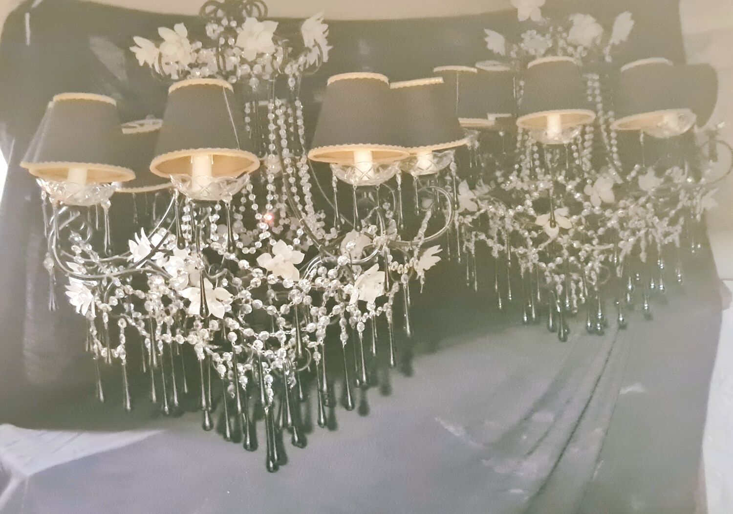 Pair of chandeliers in lacquered metal and faceted pearls