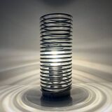 Massive chrome spring lamp