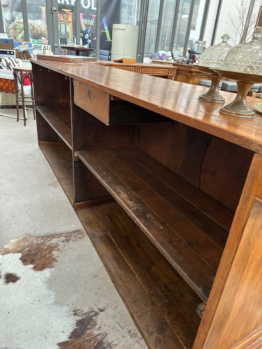 Large corner bar counter from the late 19th century.