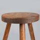 French hand crafted brutalist rustic low tripod stool in solid wood