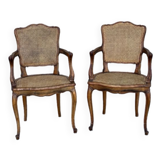 Paire de fauteuils cannés