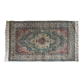 Handmade oriental carpet 230 x 145 cm Green background