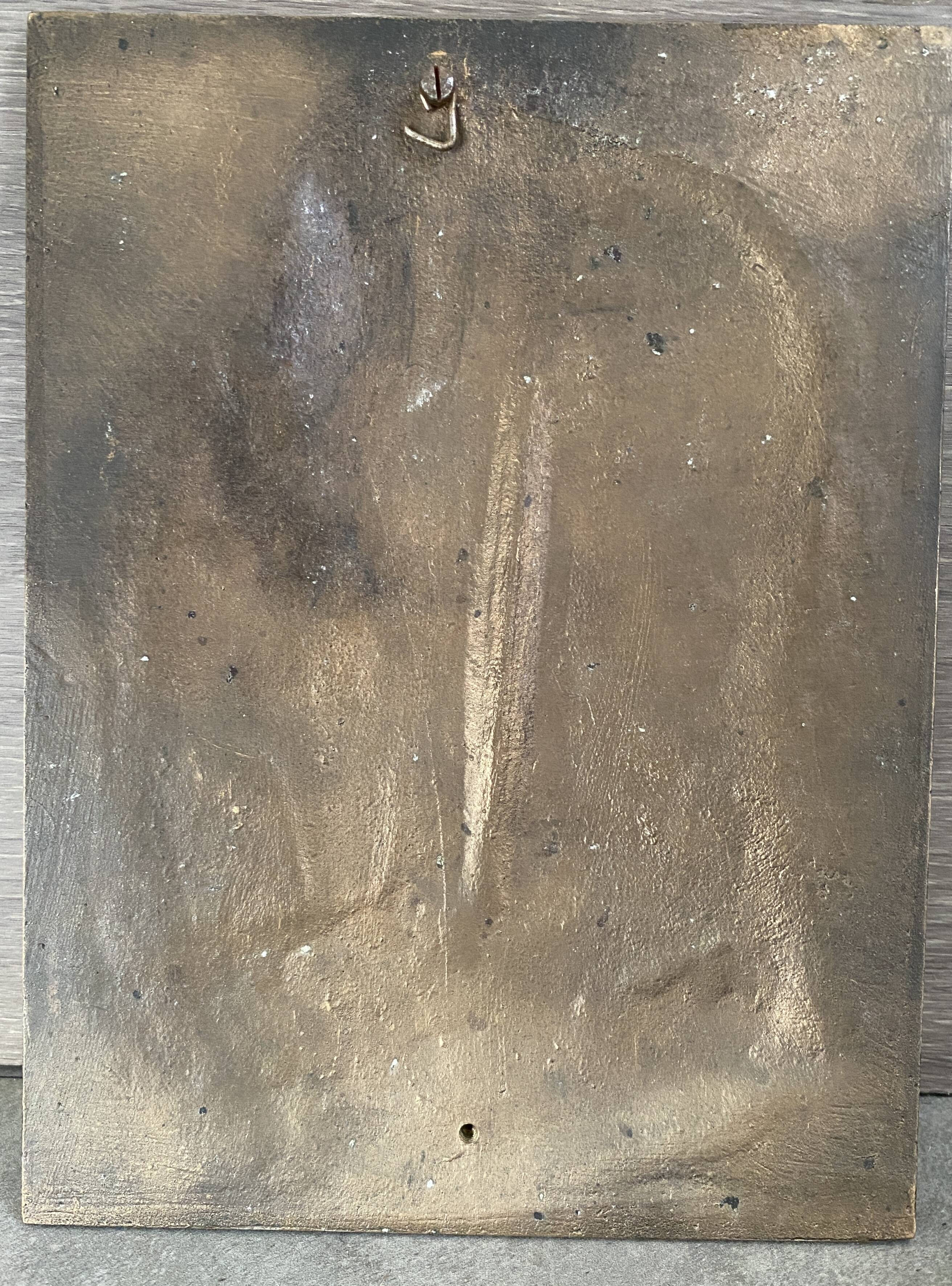 Bronze bas-relief of the Virgin
