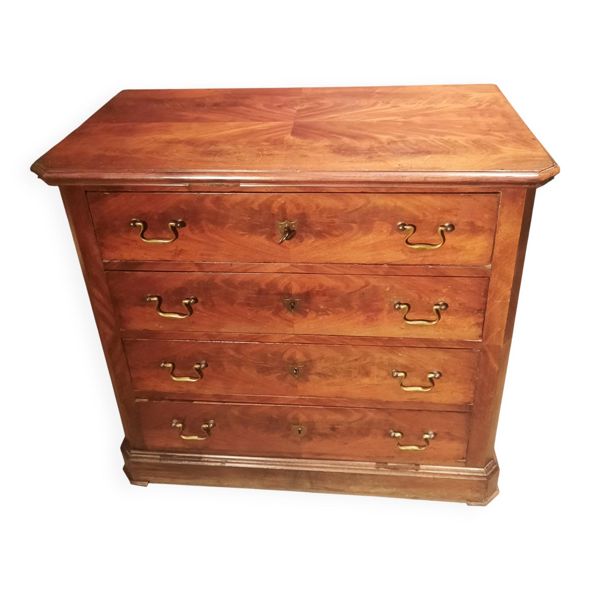 Small Louis Philippe chest of drawers with cut corners.