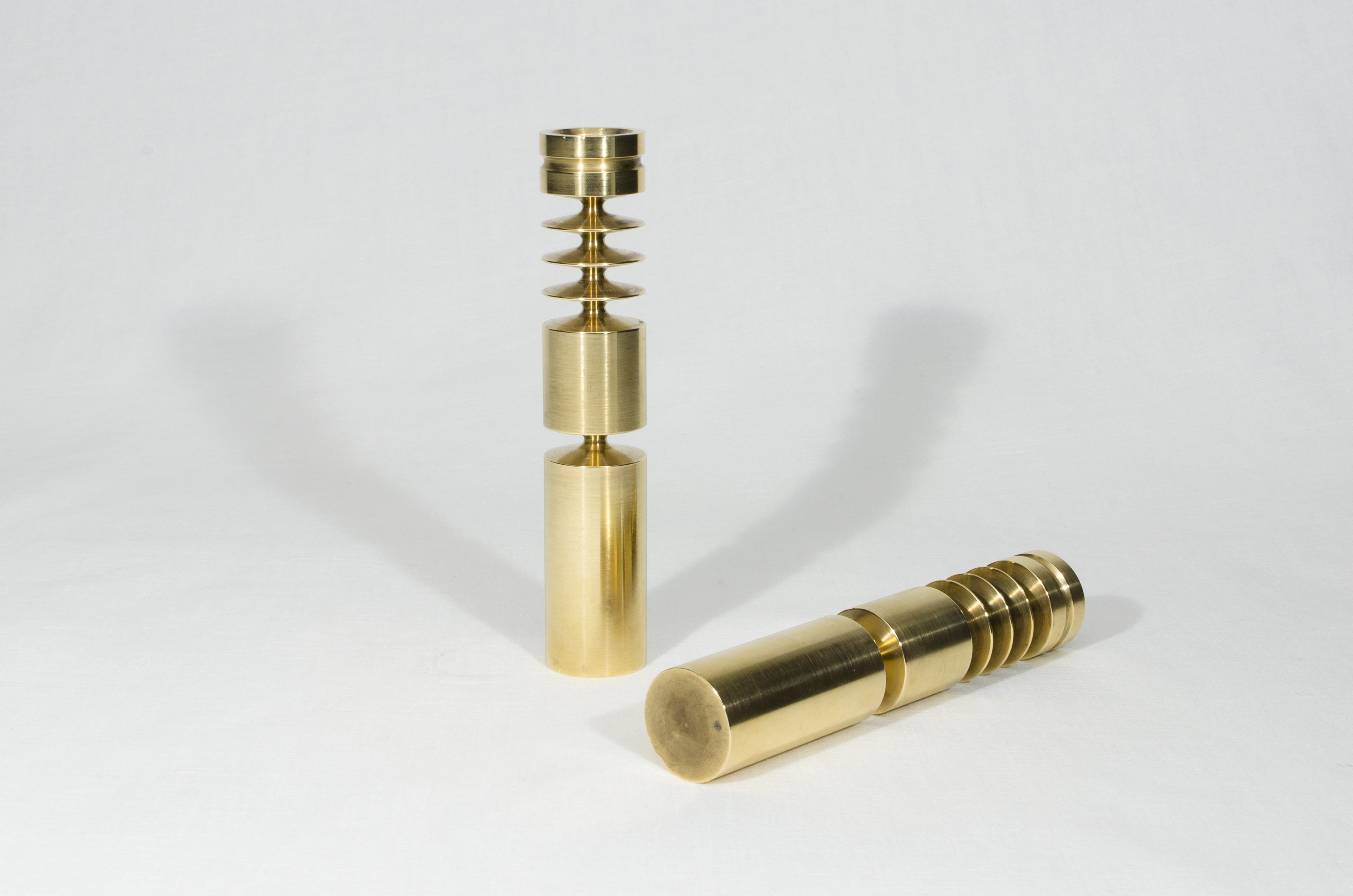 pair of scandinavian brass candlesticks  circa 1960