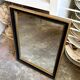 Miroir rectangulaire en bois noir et doré 45 x 35 cm