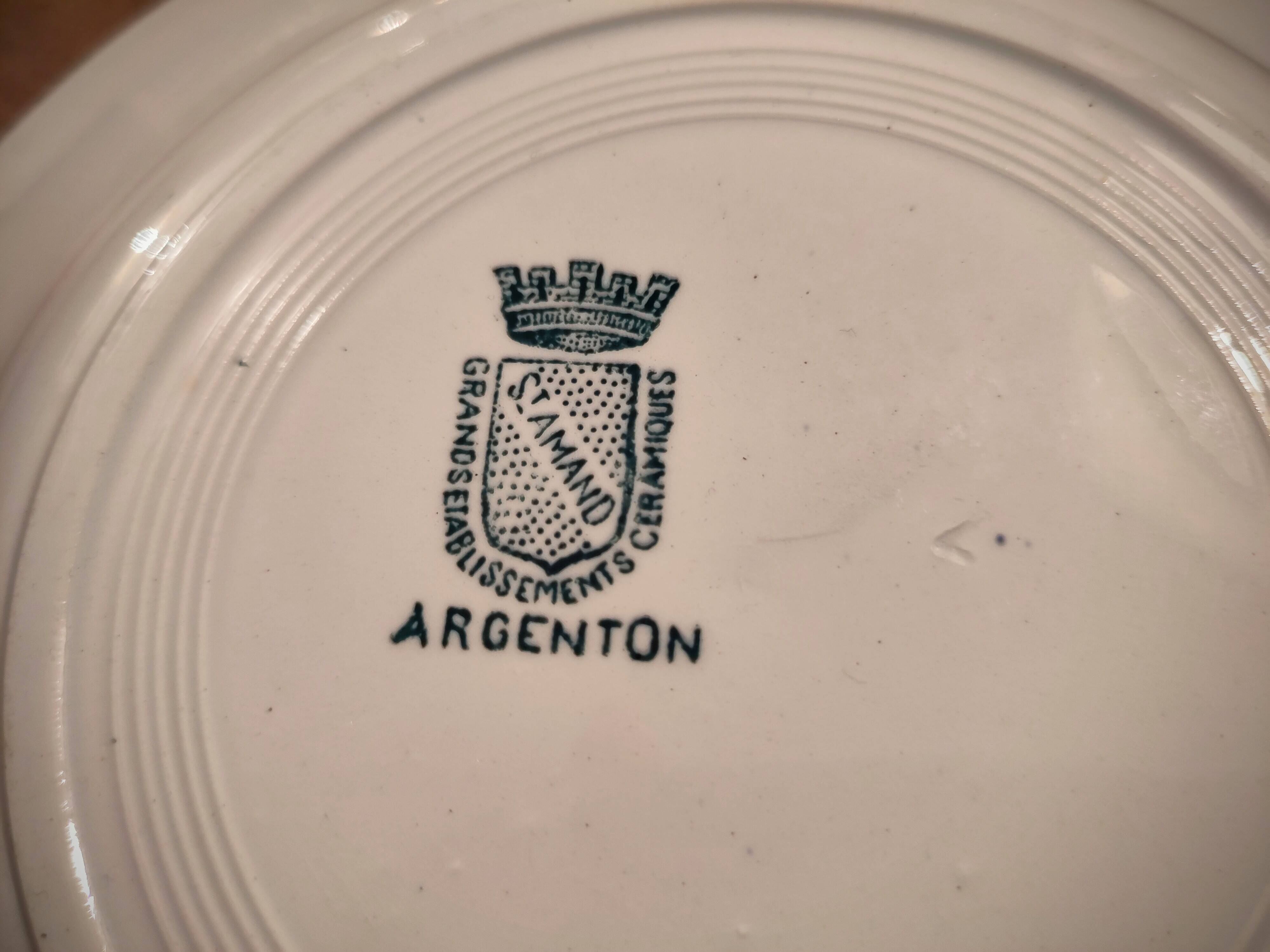 Four Saint Amand plates