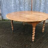 Round table in solid cherry wood, extendable with twisted legs, Louis Philippe style.