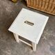 White wooden stool