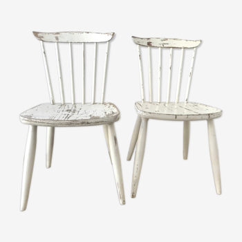 Pair of patinated white vintage chairs