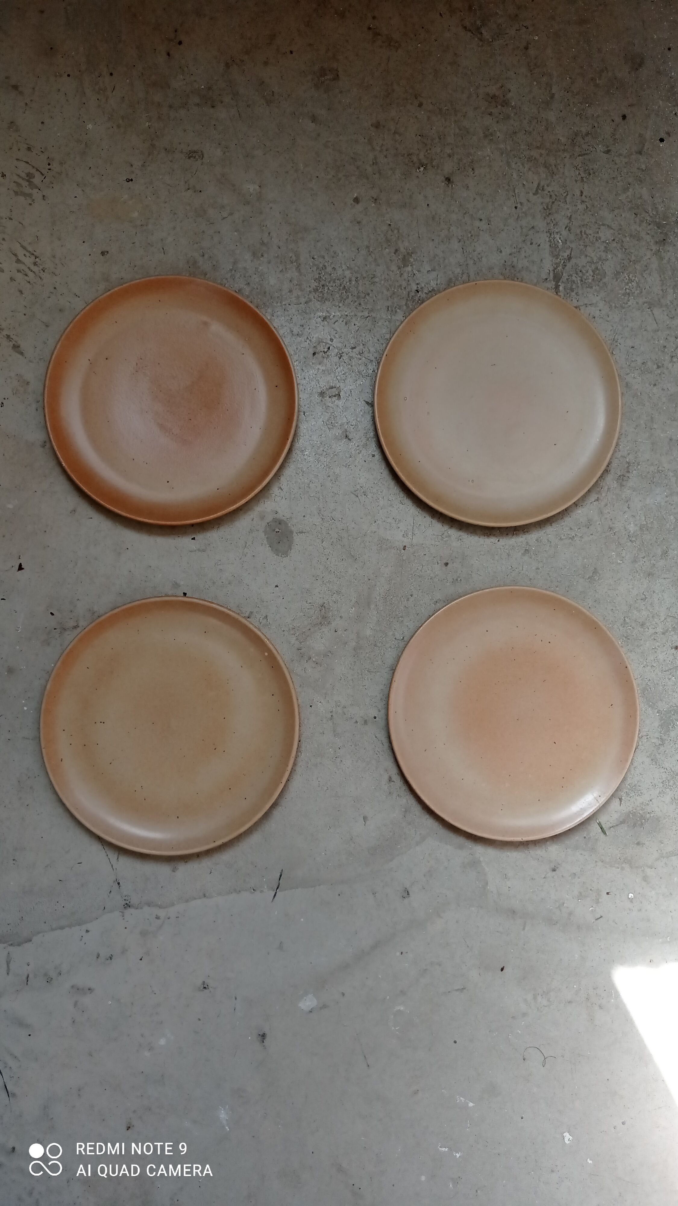 Set of four plates in sandstone