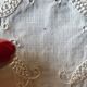 Former embroidered doily