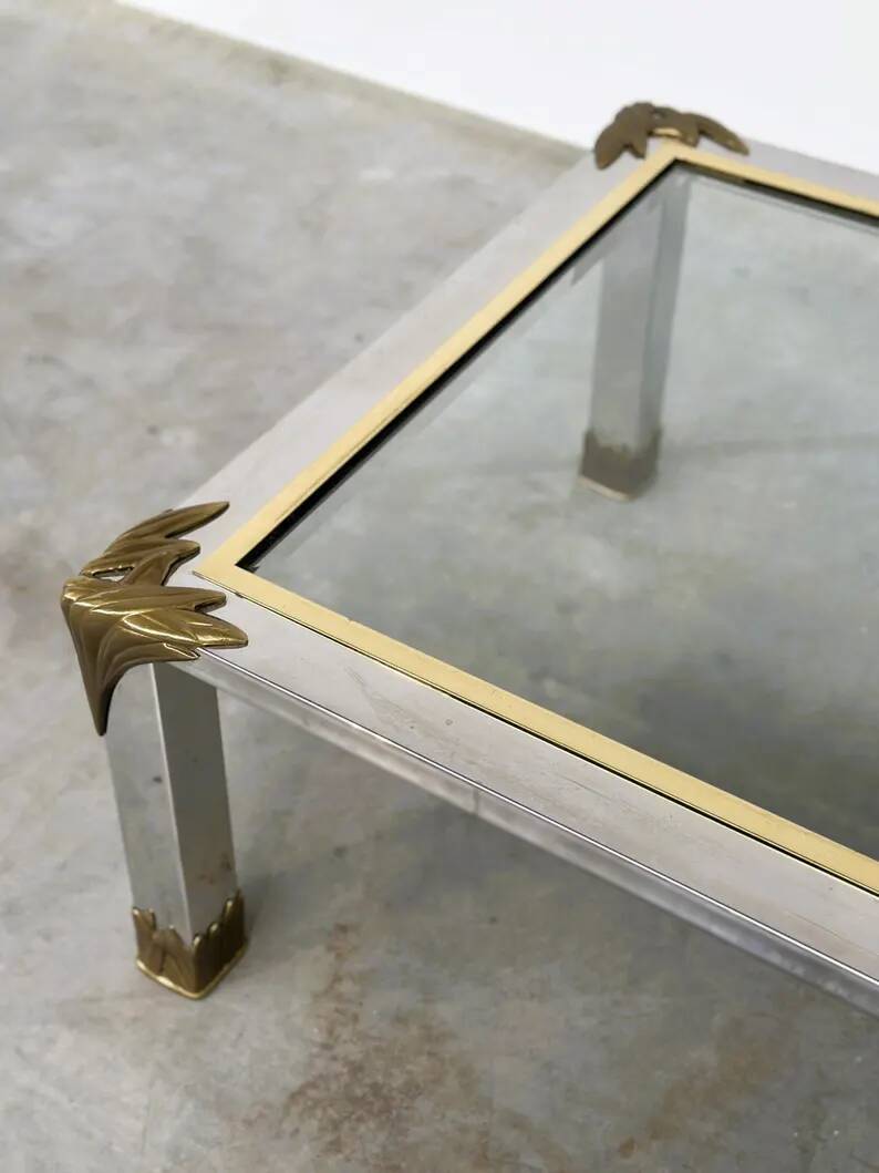 Vintage coffee table in chrome and brass adorned with sculpted leaf details, 1970s