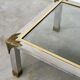 Vintage coffee table in chrome and brass adorned with sculpted leaf details, 1970s