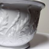 Antique cache-pot in Limoges porcelain with a relief decoration of foliage.
