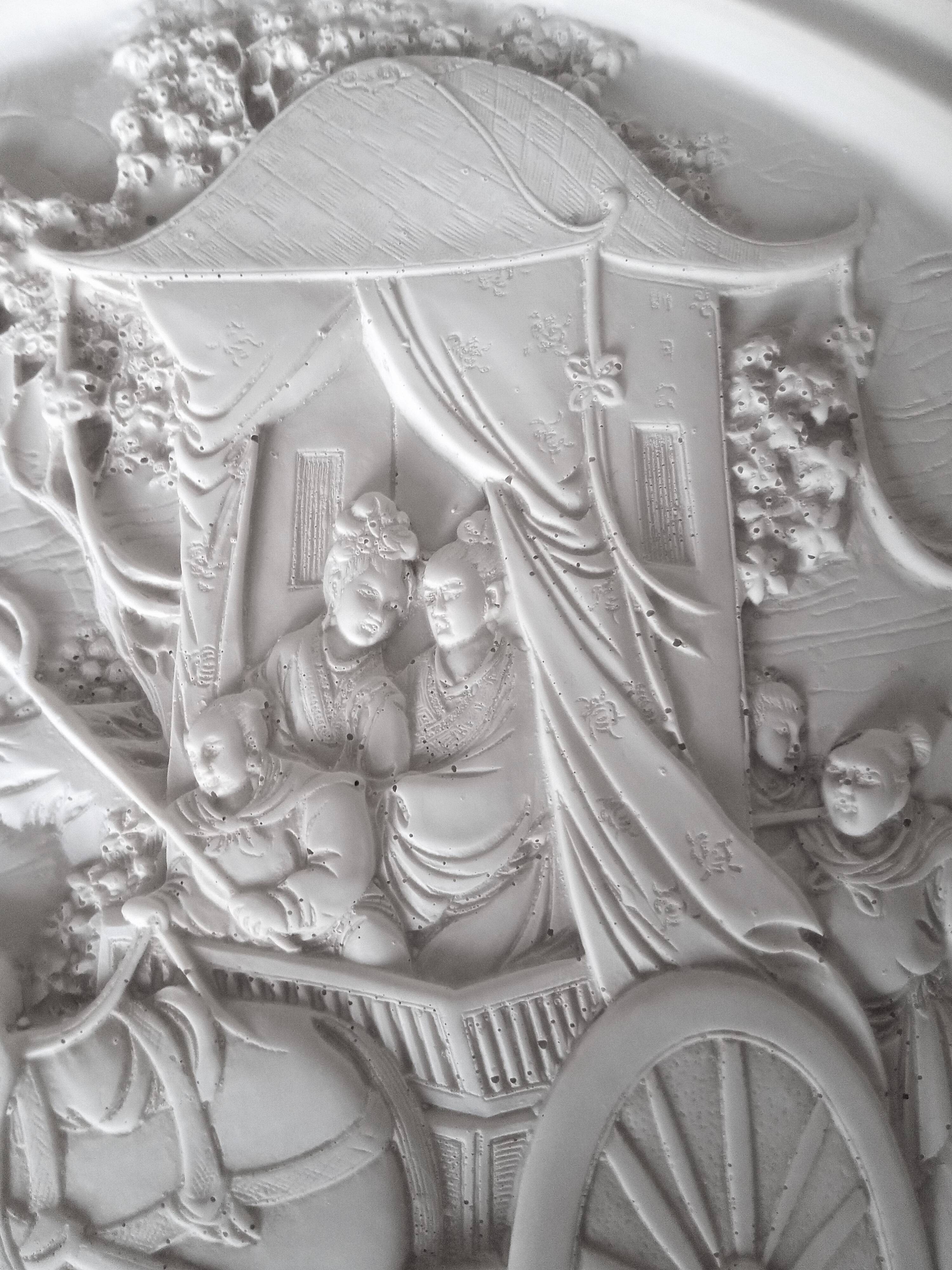 Large Chinese resin dish, sculpted motifs, signed