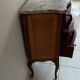 Marble inlaid commode