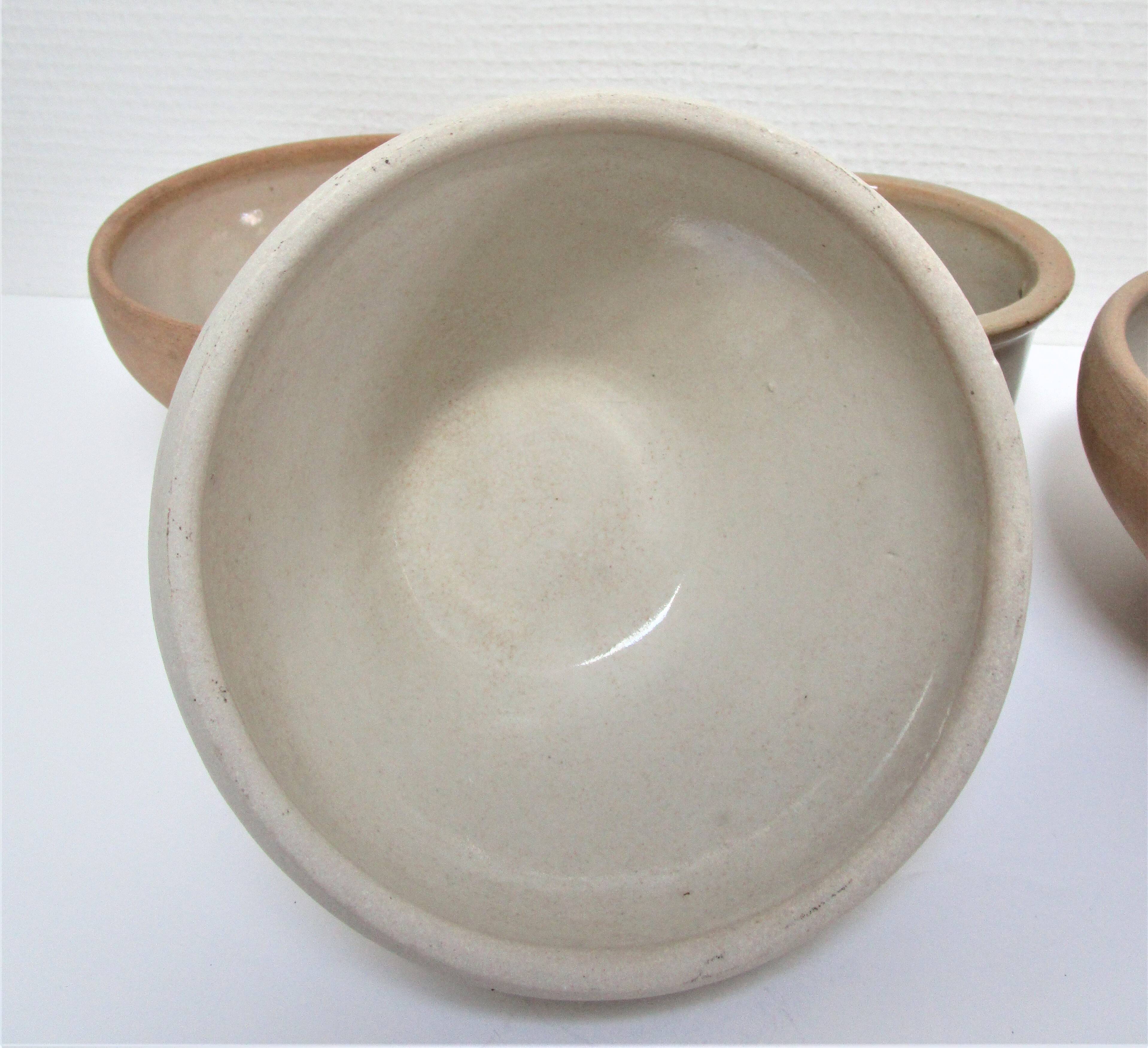 Three XL bowls and old stoneware dish