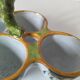 Antique egg holder by Jules Verlingue with polychrome floral decoration.