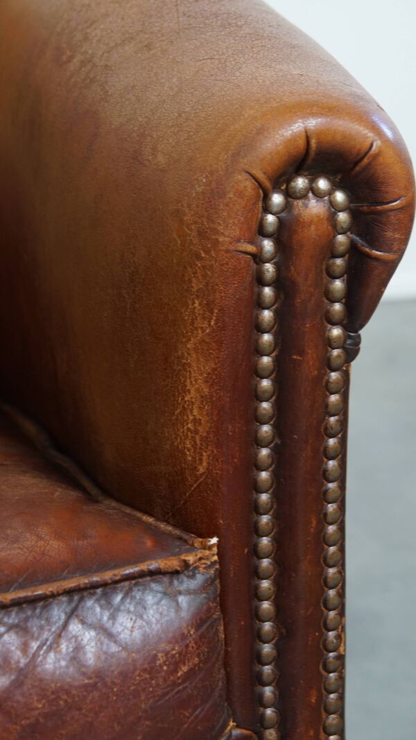 Fauteuil club en cuir de mouton couleur cognac