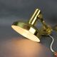 Set of four adjustable brass wall lights, Germany, 1960s.