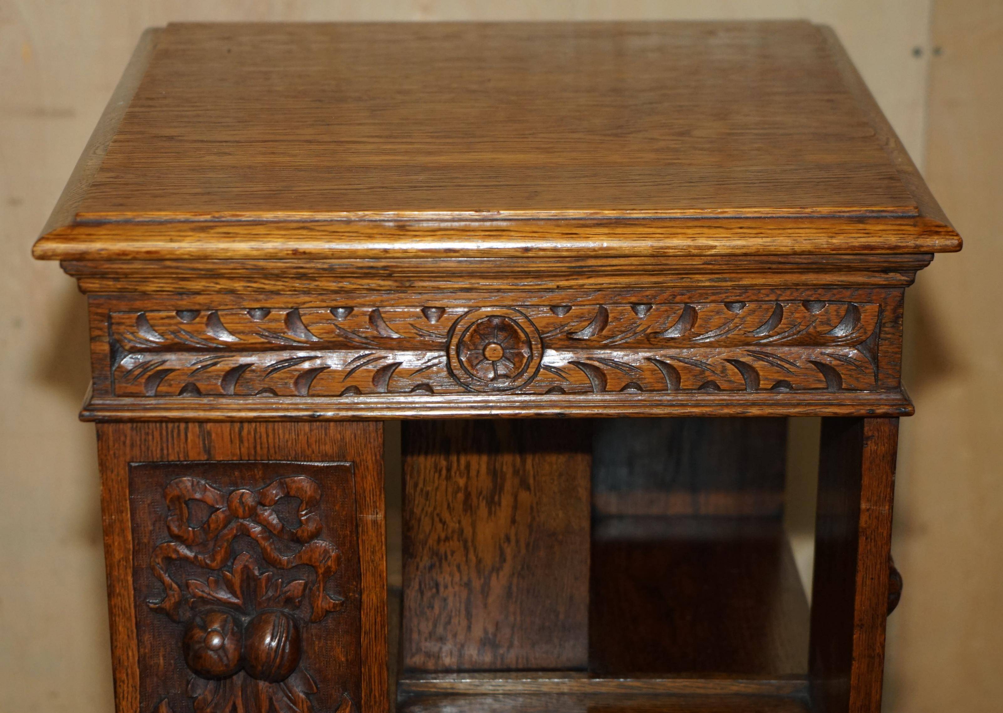 Victorian carved oak revolving library, circa 1880.