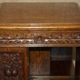 Victorian carved oak revolving library, circa 1880.