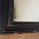 19th century blackened mirror with pitted glass 34cm x 40cm